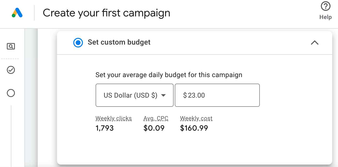 A screenshot of an ad campaign being built out in Google Ads. The screen reads "Create your first campaign" with "set custom budget" toggled on detailing an ad spend of $23 (USD) per day for a projected 1,793 weekly clicks, average cost per click (CPC) of $0.09, and weekly cost of $160.99. Adjusting the daily budget allows for setting the maximum spend within a particular timeframe for specific ad campaigns. Truth Tree knows schools. Truth Tree knows digital marketing. Truth Tree knows school marketing.