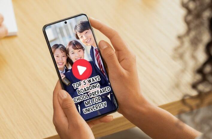 Person holding a smartphone open to a YouTube video of 3 students smiling at the camera wth text overlayed that reads "5 Ways Boarding School Prepared Me for University" | Image accompanies a blog post titled "How Schools Can Leverage a YouTube Channel for Enr
