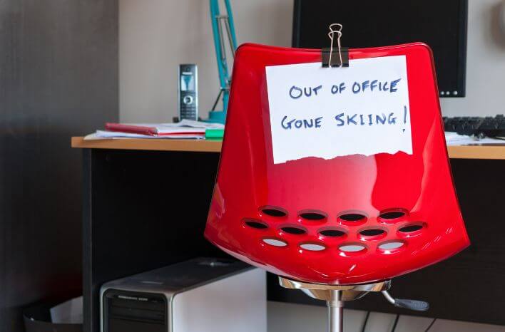 Red chair with out-of-office sign