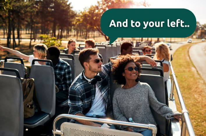 Group on bus enjoying a tour | accompanies a blog post on the impact of school tours being tailored to the family